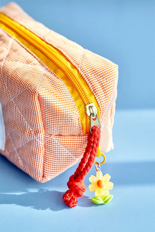 The Capsule Pouch Bag in Tangy Tangerine