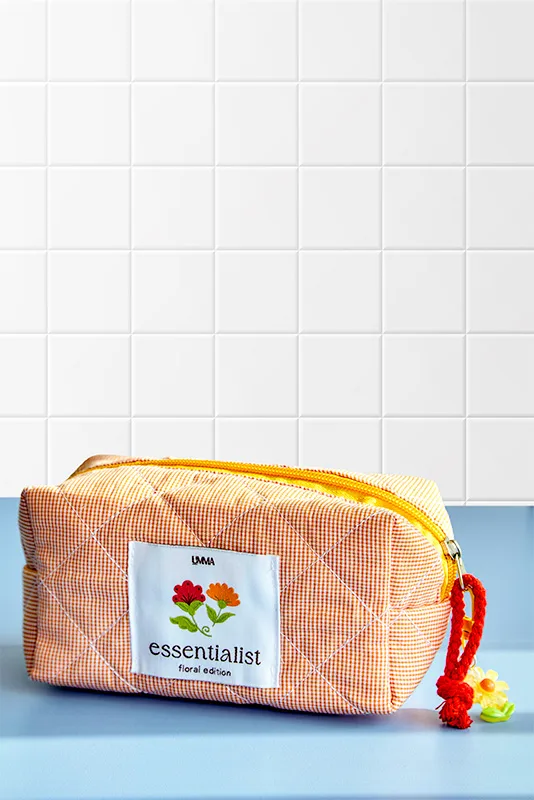 The Capsule Pouch Bag in Tangy Tangerine